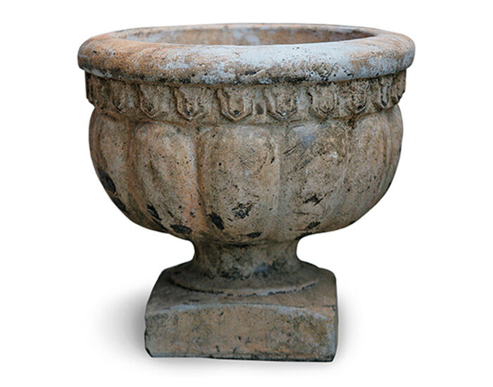 round cast stone pot in