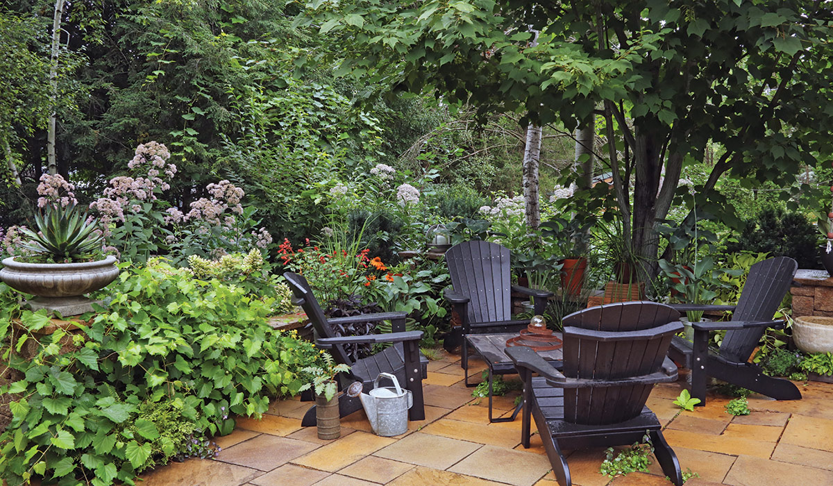 patio with four Adirondack chairs